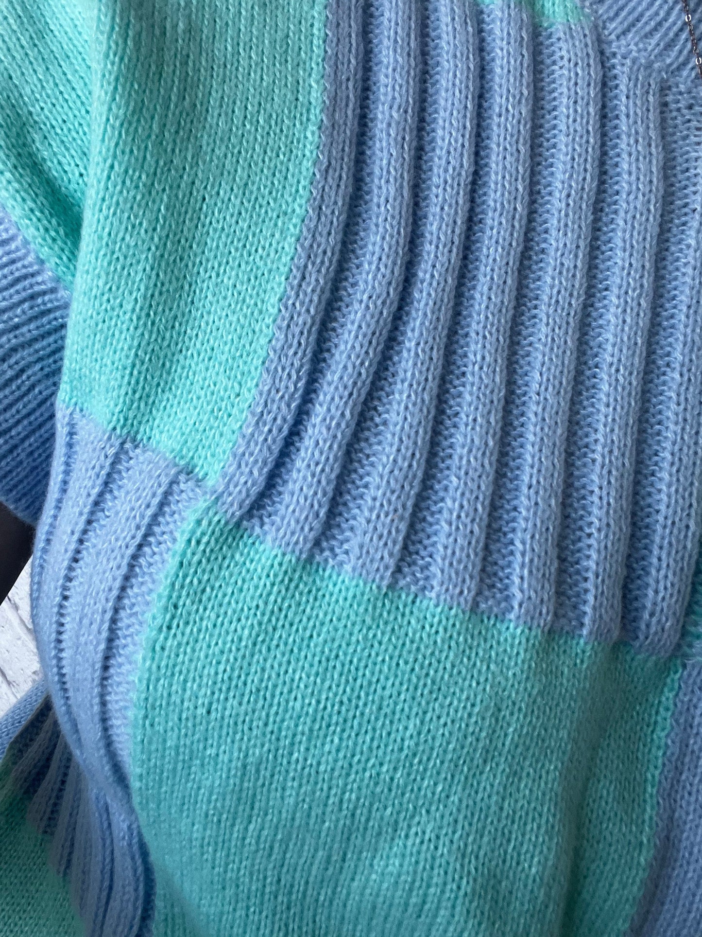 blue-checkered-sweater