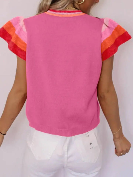 Women's pink and orange striped sweater featuring a bright, colorful striped design.