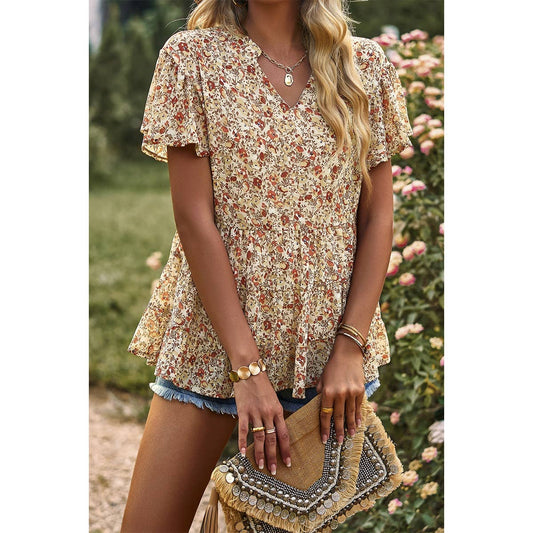 This western chic floral shirt is a versatile piece and a great transition to fall. The brown and tan colors add a western flare.
