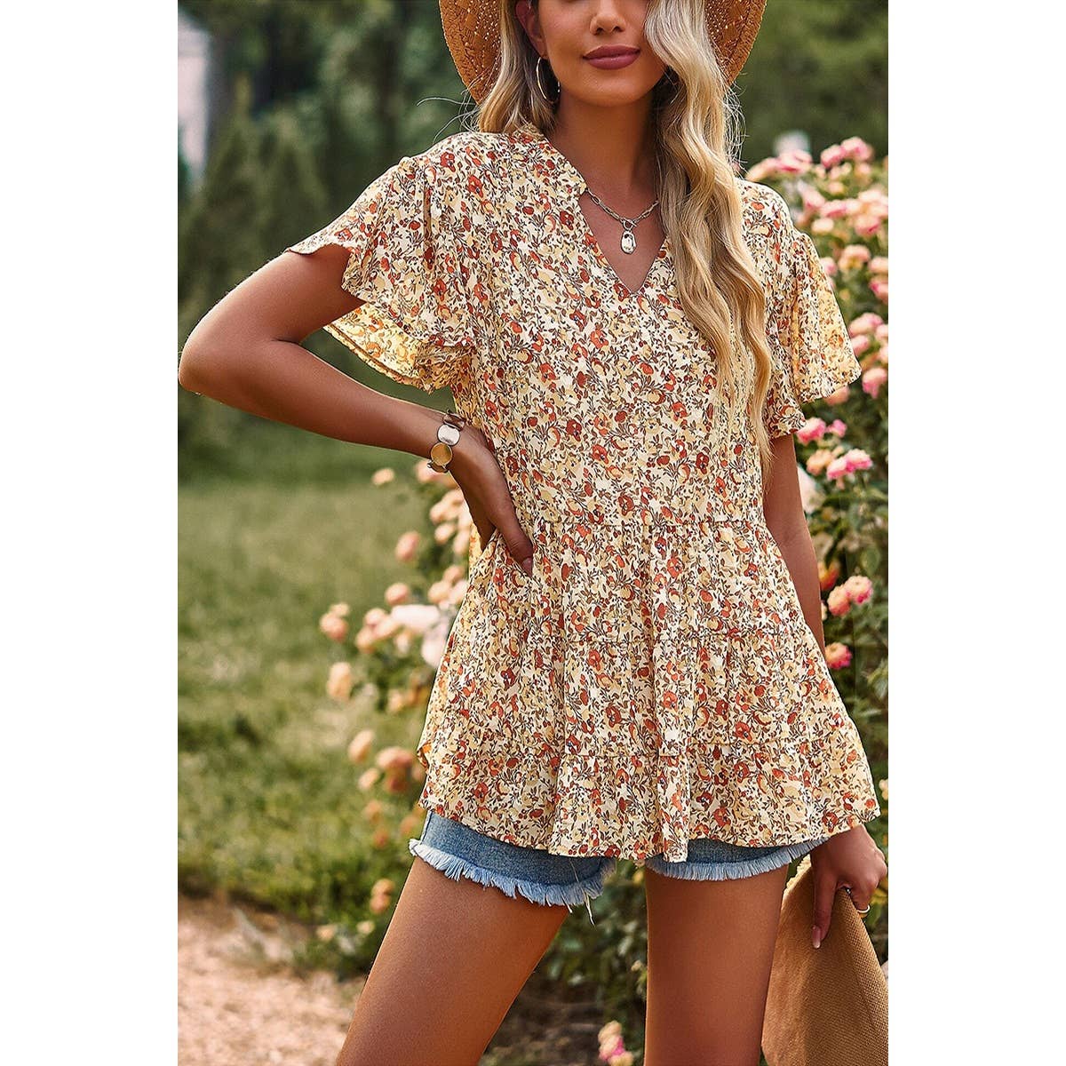 This western chic floral shirt is a versatile piece and a great transition to fall. The brown and tan colors add a western flare.
