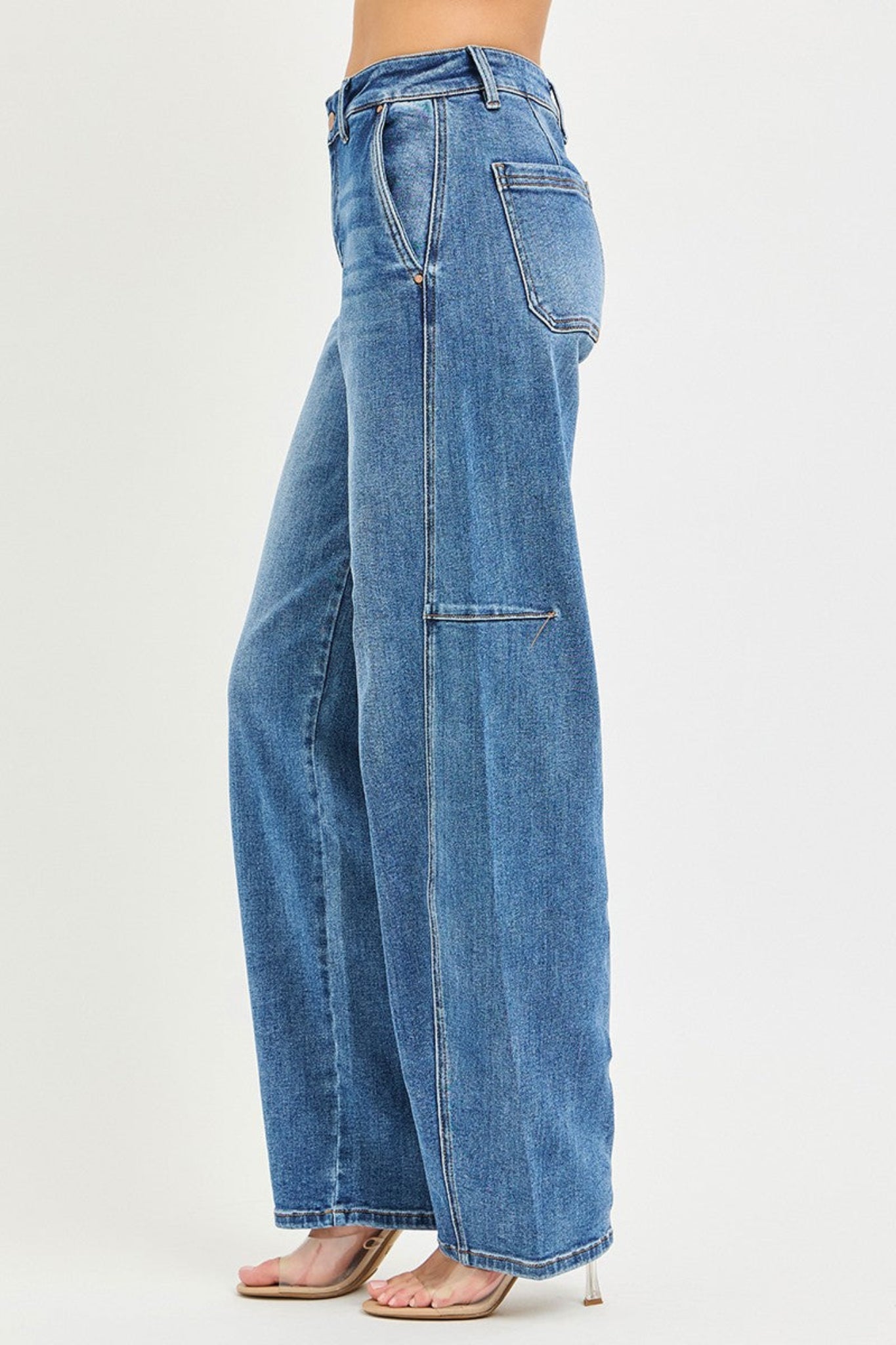 RISEN slouchy baggy jeans in medium wash denim with relaxed oversized fit, casual wide leg silhouette, and comfortable everyday style. Trendy boutique denim perfect for laid-back outfits and effortless street-style looks.