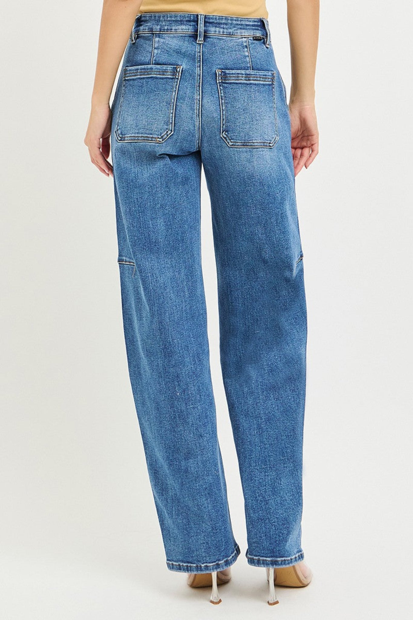 RISEN slouchy baggy jeans in medium wash denim with relaxed oversized fit, casual wide leg silhouette, and comfortable everyday style. Trendy boutique denim perfect for laid-back outfits and effortless street-style looks.
