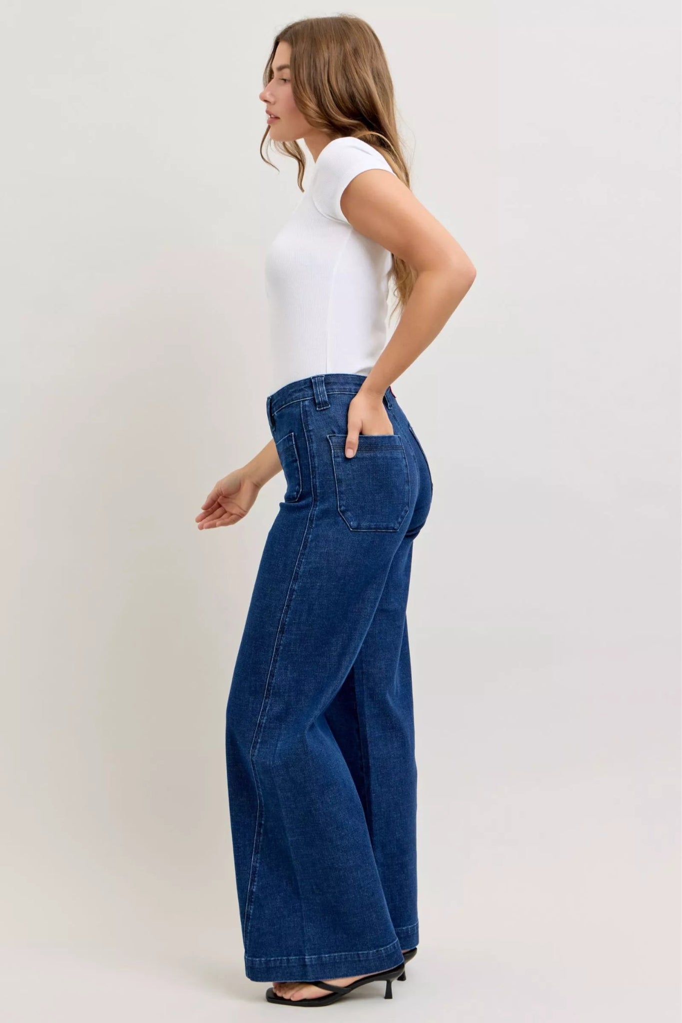 Women’s high rise dark wash wide leg jeans with front patch pockets and comfort stretch denim