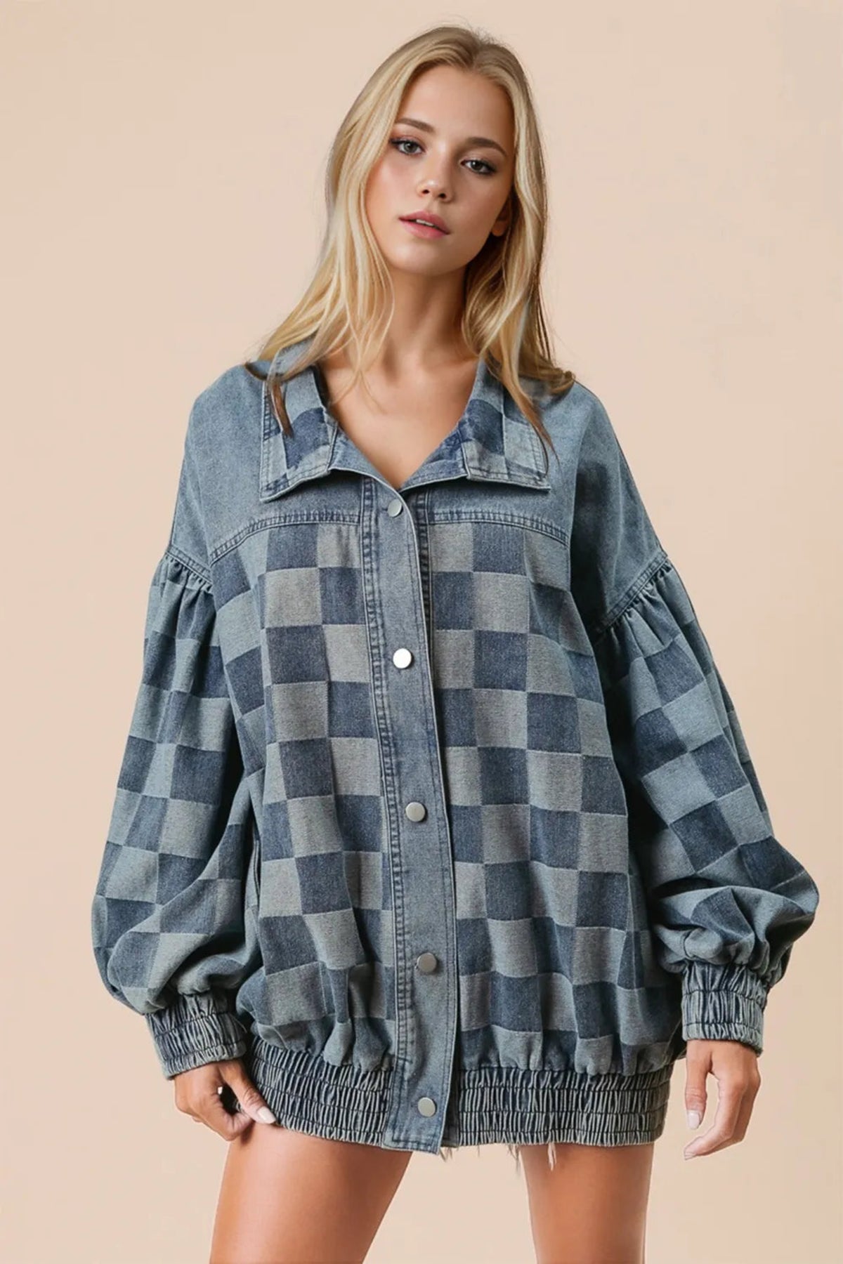 Checkered button up denim jacket with balloon sleeves styled with black pants