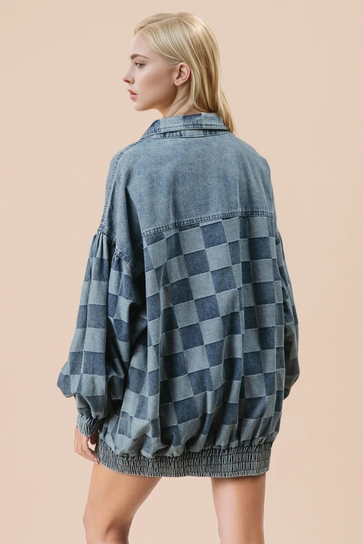Checkered button up denim jacket with balloon sleeves styled with black pants