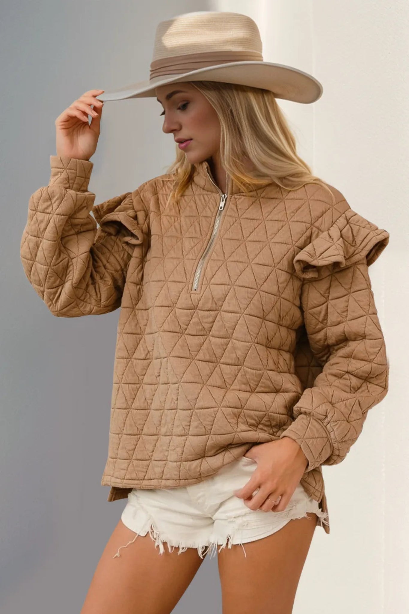 Mocha quilted ruffle shoulder half zip pullover with relaxed fit and long sleeves