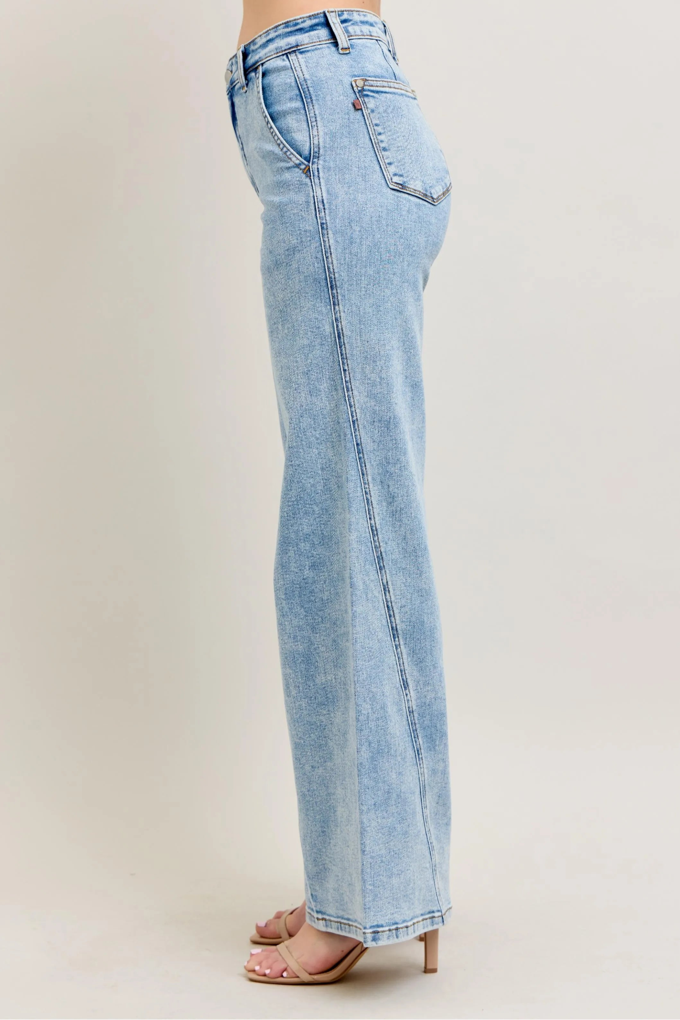 Judy Blue high waist light wash wide leg jeans with skewed inseam and relaxed fit
