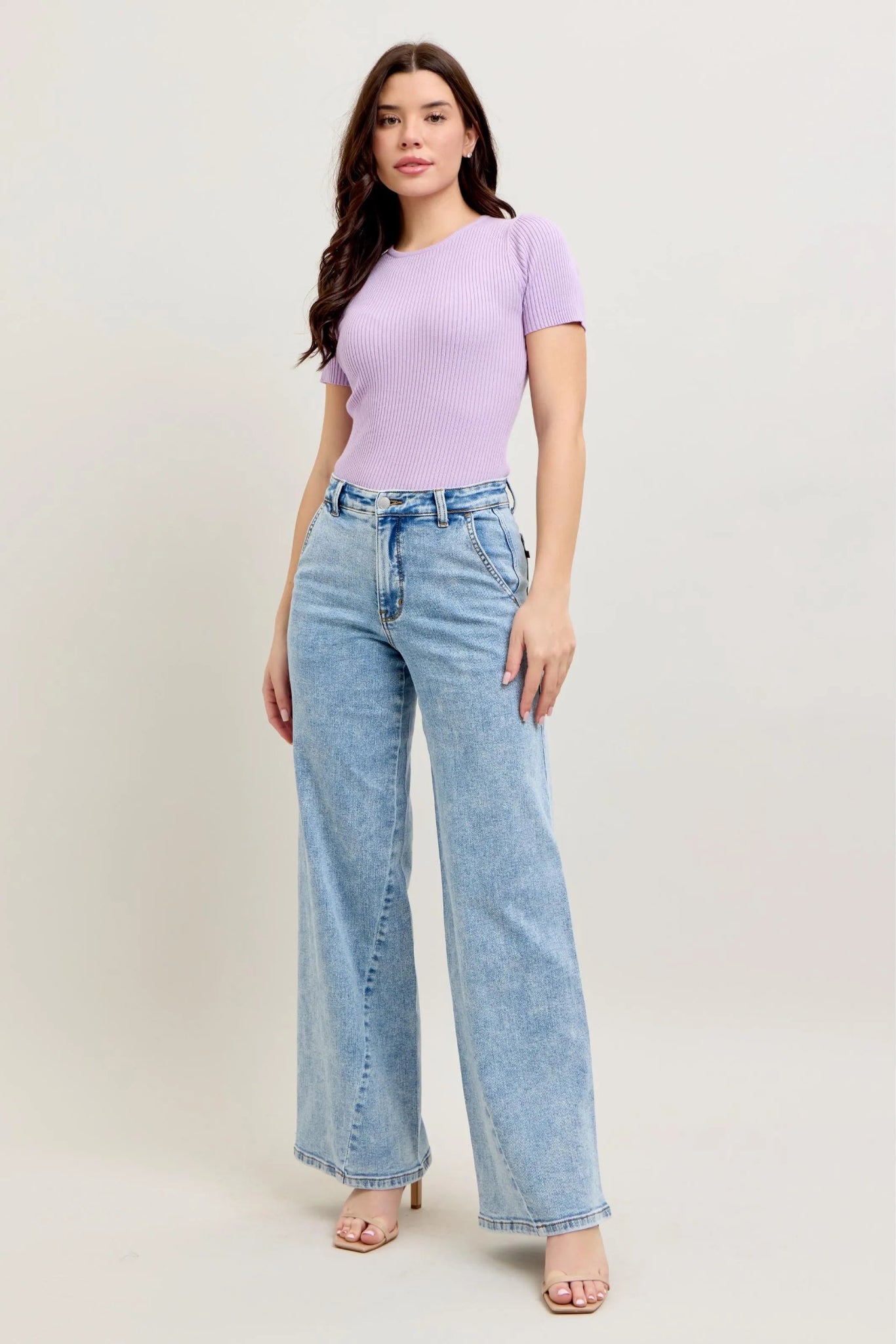 Judy Blue high waist light wash wide leg jeans with skewed inseam and relaxed fit