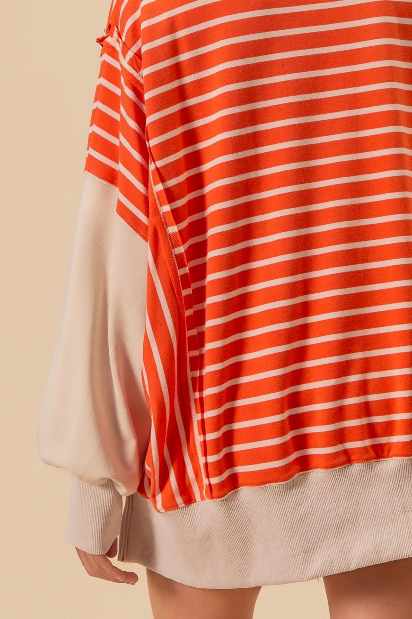 BiBi orange and cream striped loose fit collared knit pullover with contrast sleeves