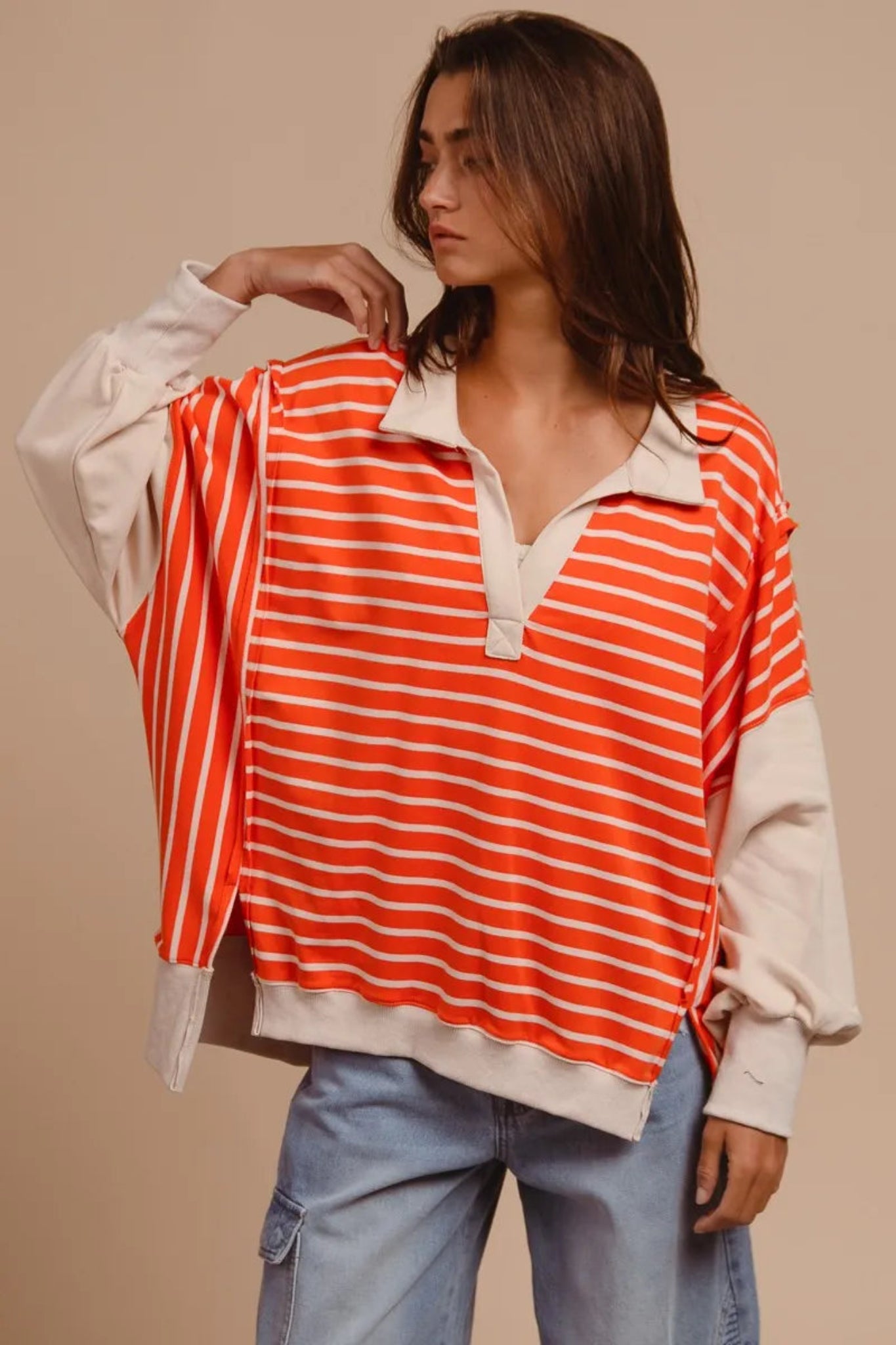 BiBi orange and cream striped loose fit collared knit pullover with contrast sleeves