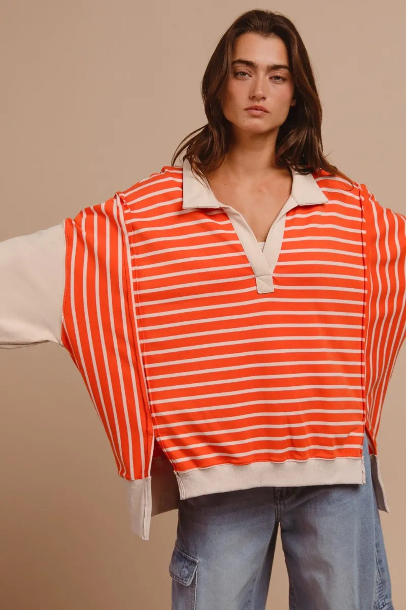 BiBi orange and cream striped loose fit collared knit pullover with contrast sleeves