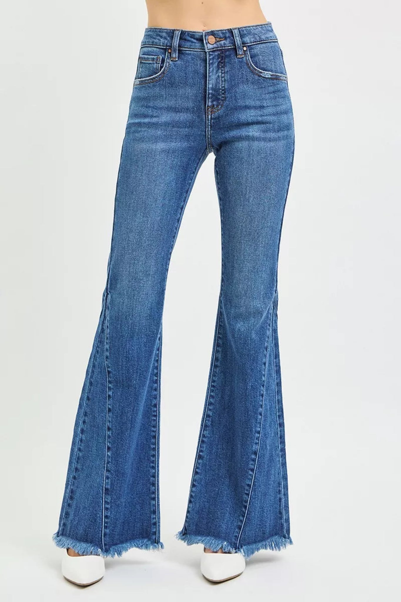 RISEN Mid Rise Flare Side Seam Detailing Jeans in medium wash denim with flattering mid-rise fit, subtle side seam detailing, and trendy flare leg silhouette. Comfortable stretch denim perfect for everyday wear, casual outfits, and boutique fashion styling.