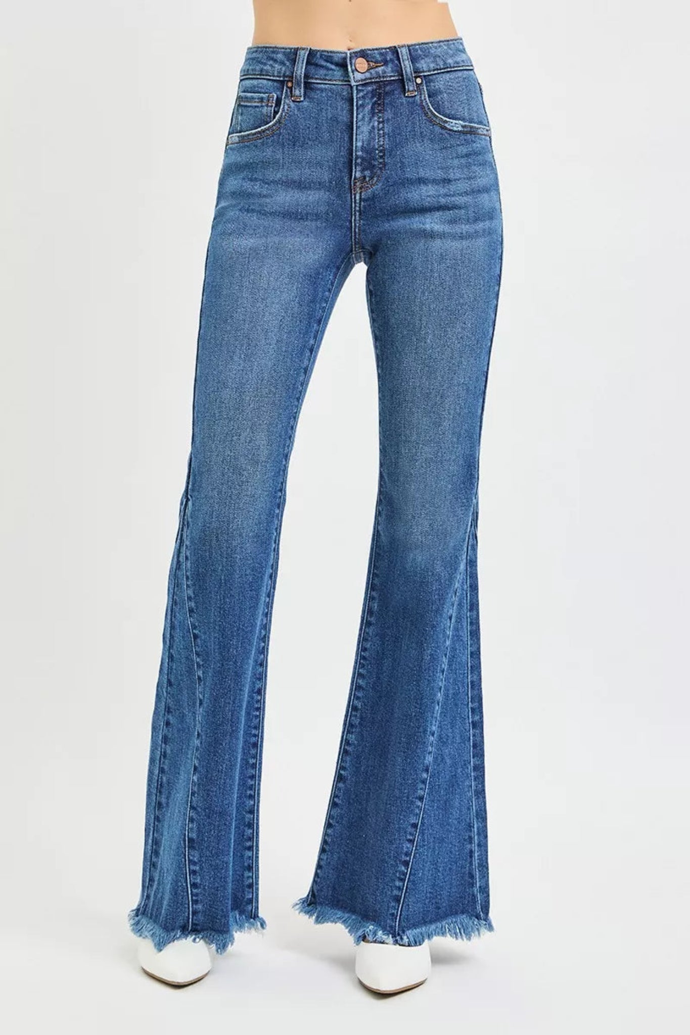 RISEN Mid Rise Flare Side Seam Detailing Jeans in medium wash denim with flattering mid-rise fit, subtle side seam detailing, and trendy flare leg silhouette. Comfortable stretch denim perfect for everyday wear, casual outfits, and boutique fashion styling.