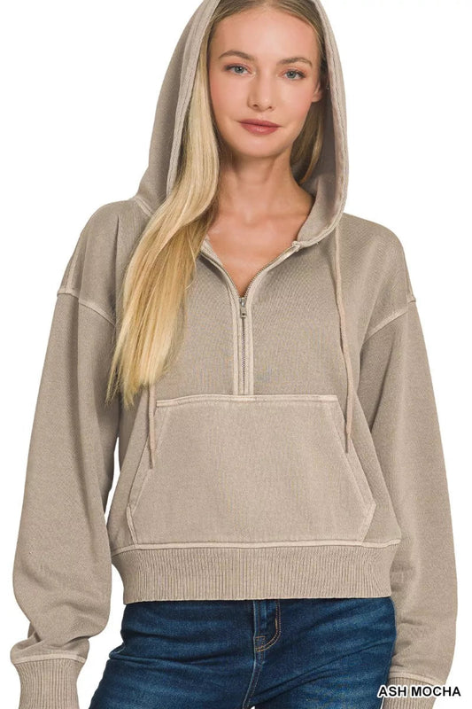 Model wearing an ash mocha half-zip hoodie with hood, kangaroo pocket, and relaxed fit casual sweatshirt.