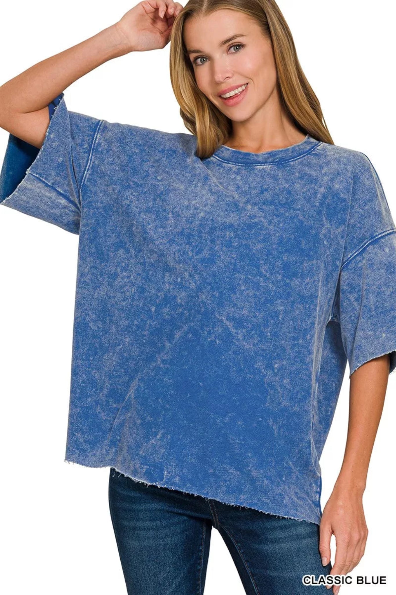 Zenana washed short sleeve top with oversized relaxed fit, mineral wash finish, and raw hem detail.