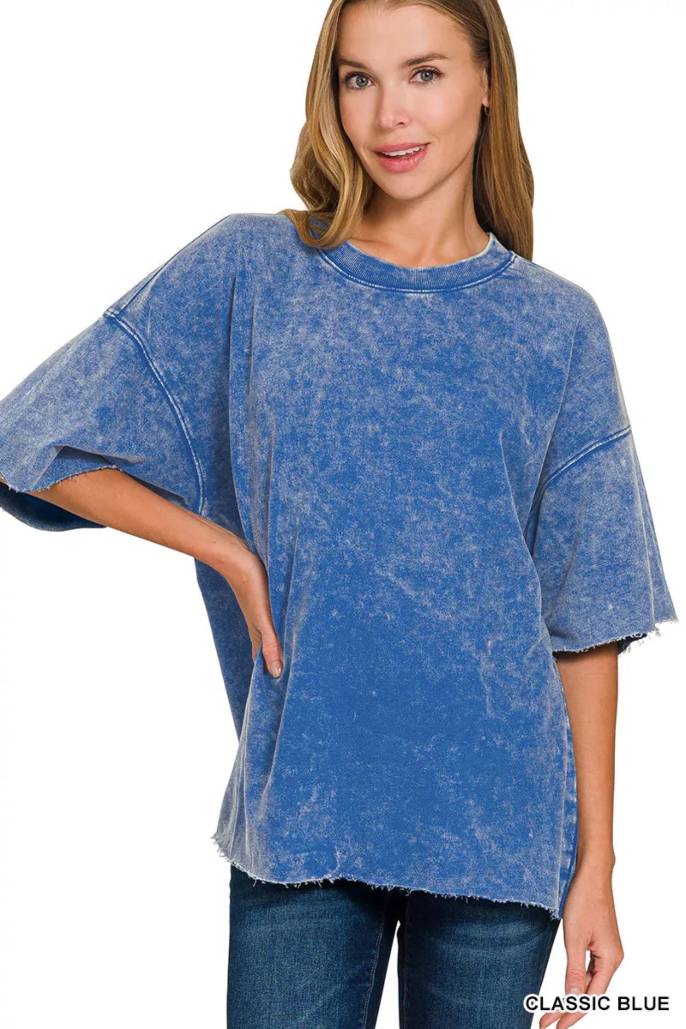 Zenana washed short sleeve top with oversized relaxed fit, mineral wash finish, and raw hem detail.