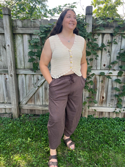 Women's Anniewear cream crochet knit tank top featuring a scalloped V-neckline, gold button-front closure, and delicate open-knit texture.